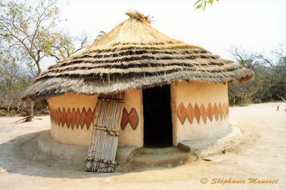 hut made of mud and branches