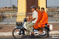 monks on a motorcycle