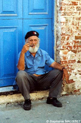 old cuban with beret and pipe