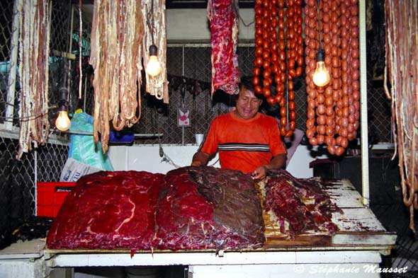 butcher selling fresh meat