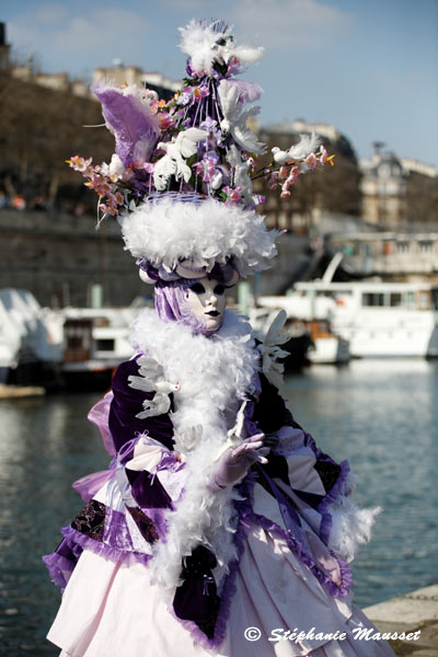 costumes and boats at the venetian carnival in paris