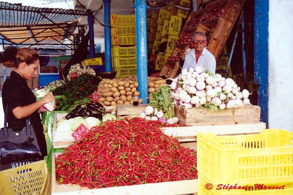 Woman at vegetable market