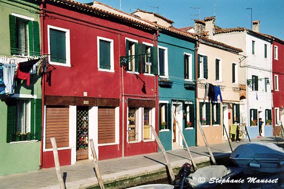 Colorful facades and boats of Burano