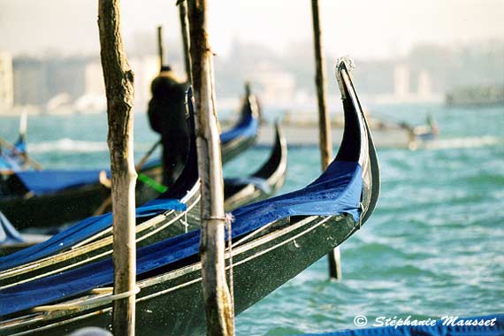 Close-up on prows of gondolas